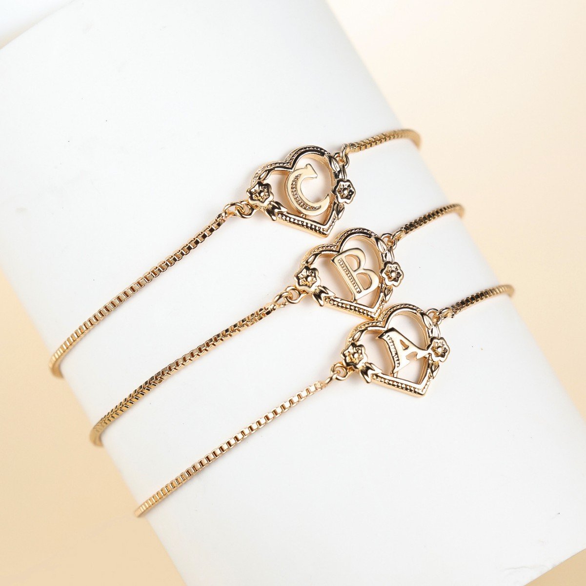 the new adjustable letter bracelet with a heart shaped flower design is a simple and fashionable jewelry the new adjustable letter bracelet with a heart shaped flower design is a simple and fashionable jewelry
