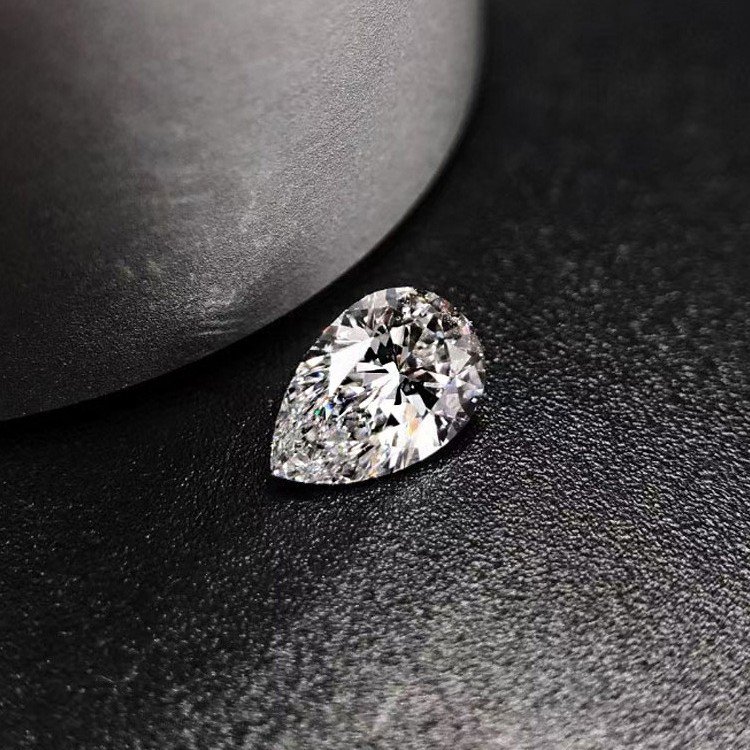 igi cultivated diamond pear shaped synthetic diamond ring necklace with naked stone drop earrings in colorless jasper igi cultivated diamond pear shaped synthetic diamond ring necklace with naked stone drop earrings in colorless jasper
